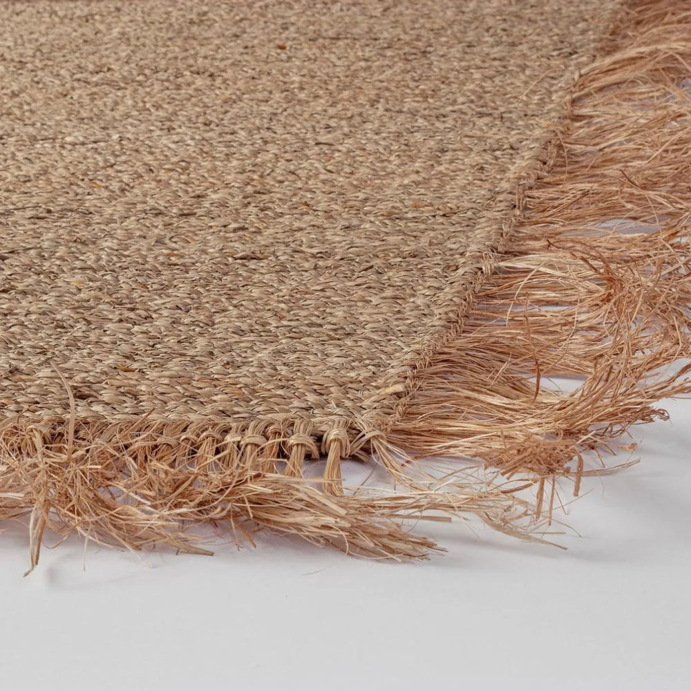  Intreccio naturale e frangia rustica del tappeto Phetra