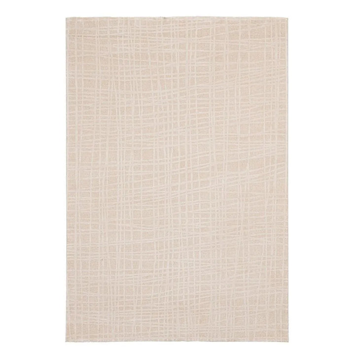 Vista dall’alto del tappeto Tania beige chiaro cream con trama geometrica