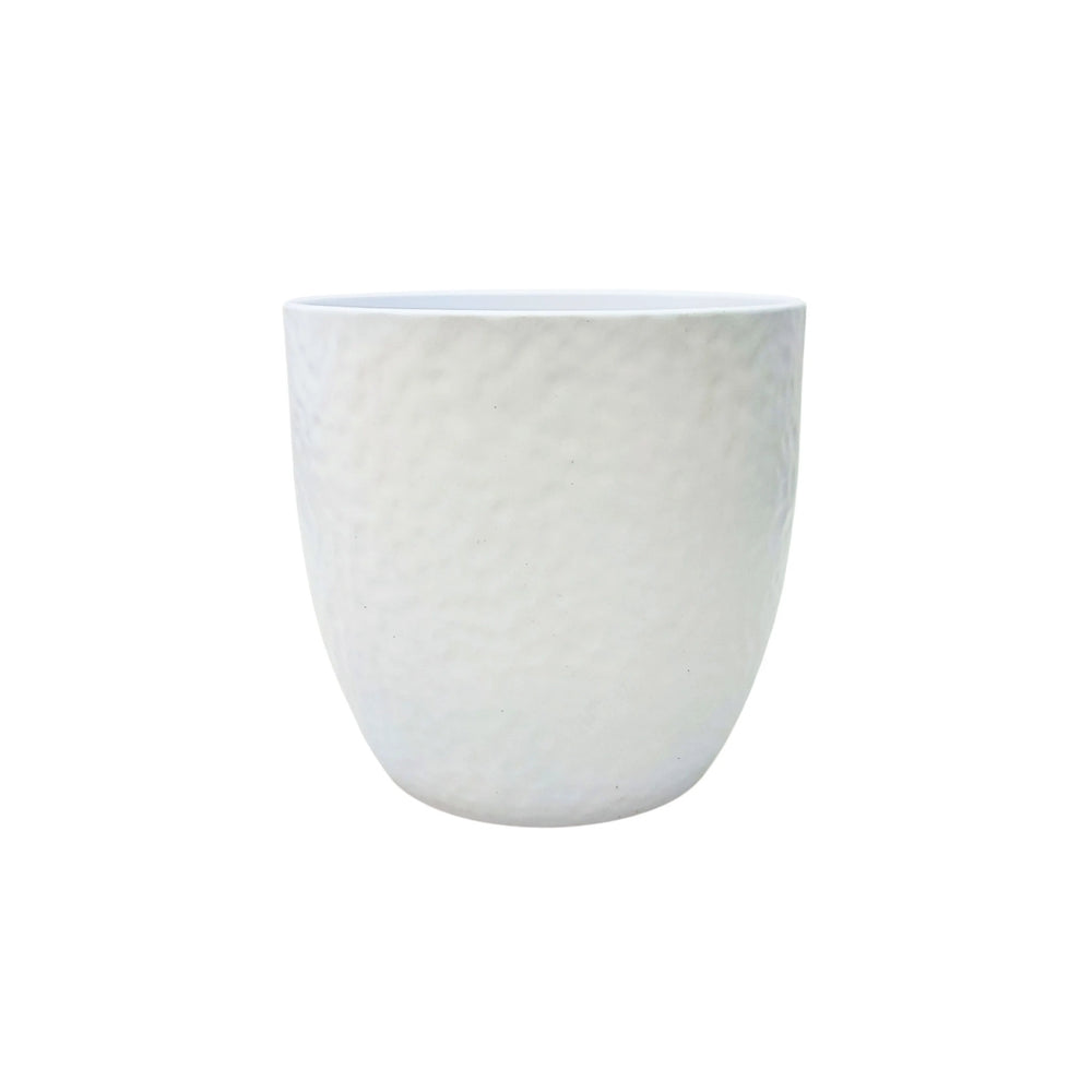 Vaso decorativo Boston in ceramica bianca opaca con finitura martellata, forma tonda.