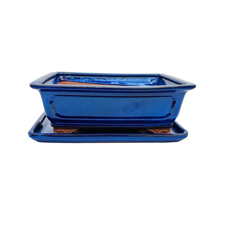 Vaso rettangolare in ceramica blu smaltata con base stabile e sottovaso abbinato

