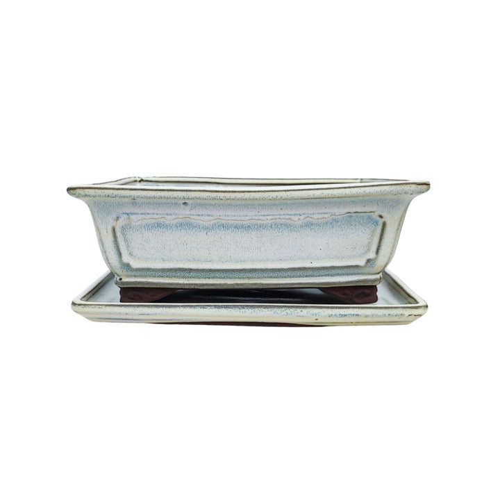 Vaso rettangolare per piante ornamentali in ceramica crema con base rialzata e fori di drenaggio