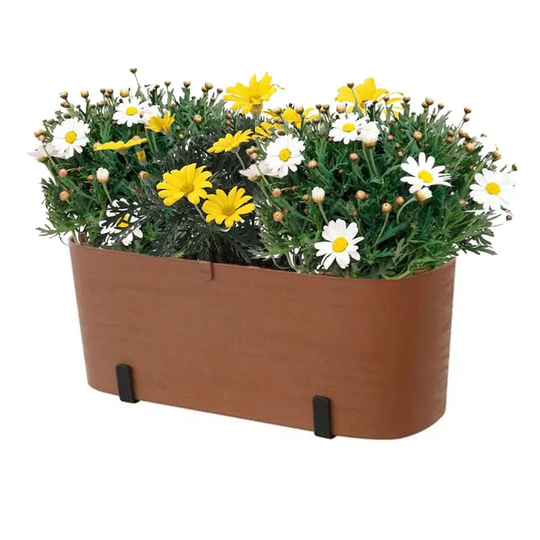 Fioriera Paros terracotta con piante fiorite

