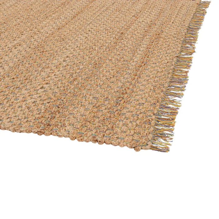 dettaglio frange e tessitura tappeto marrone azzurro per interni 