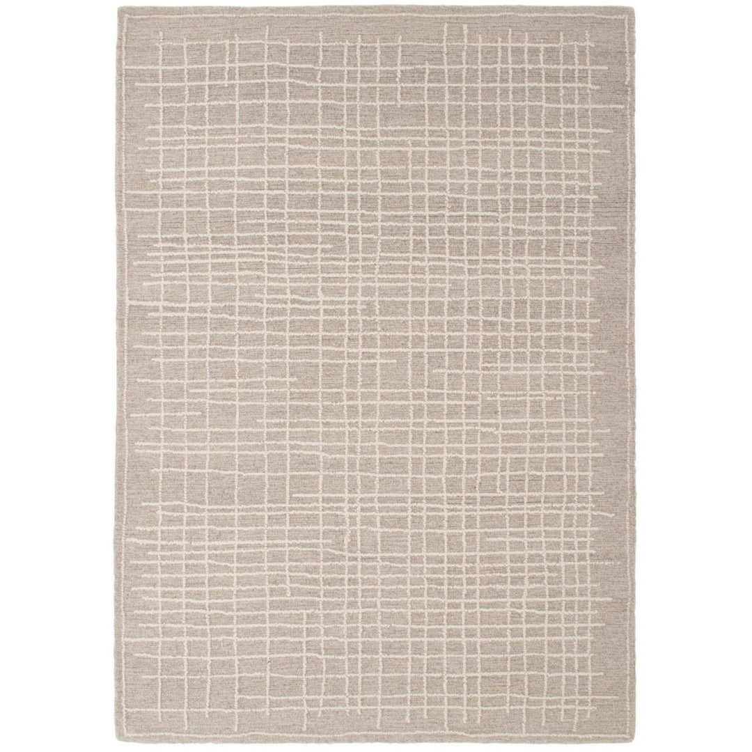 Tappeto moderno grigio chiaro con motivo geometrico a griglia in rilievo – vista dall'alto