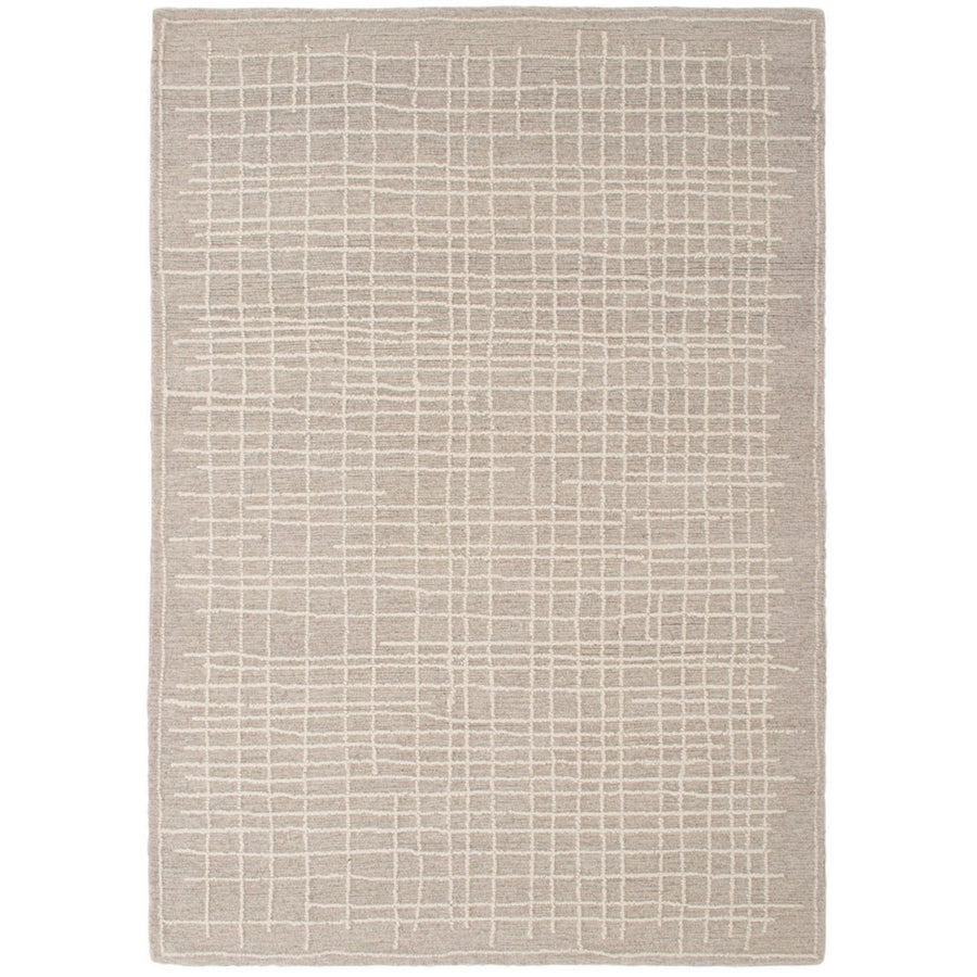 Tappeto moderno grigio chiaro con motivo geometrico a griglia in rilievo – vista dall'alto