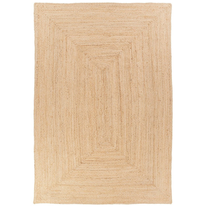 Tappeto in juta naturale con motivo geometrico rettangolare, intreccio artigianale e finitura neutra.
