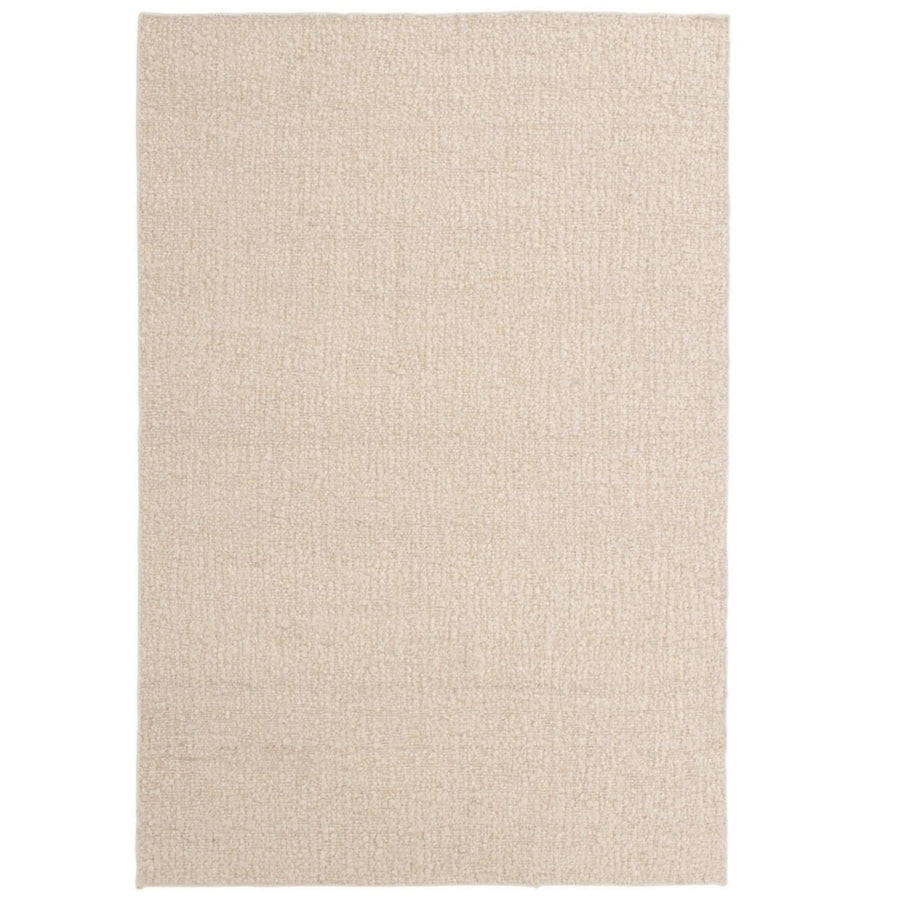 Tappeto rettangolare in fibra naturale di juta, colore beige chiaro, con texture intrecciata e superficie uniforme.

