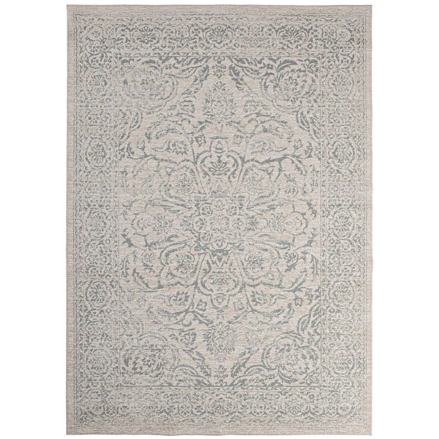 Tappeto stile orientale beige con dettagli floreali in rilievo, effetto vintage e finitura elegante.